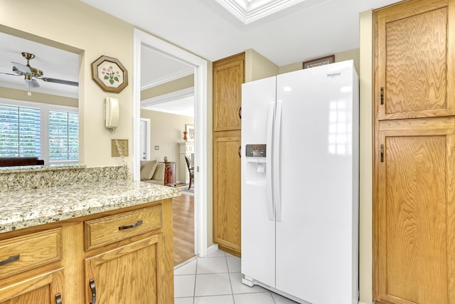bathroom with ornamental molding, a ceiling fan, and tile patterned flooring