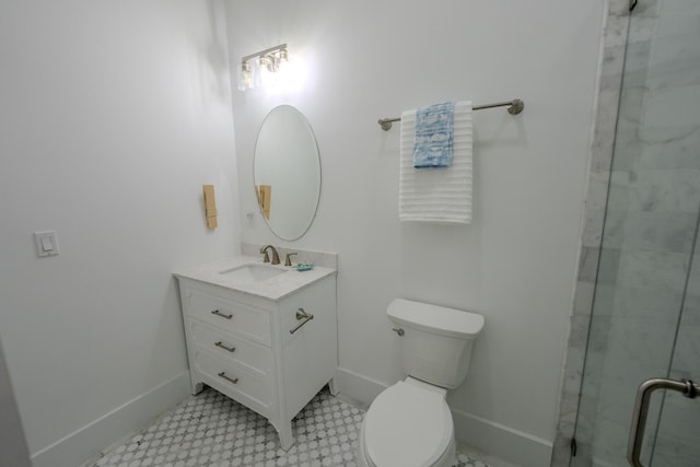 bathroom with vanity, toilet, and walk in shower