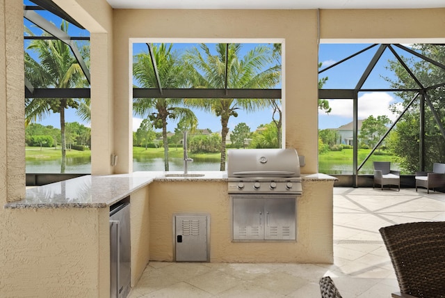 view of patio / terrace with glass enclosure, area for grilling, a water view, and a grill