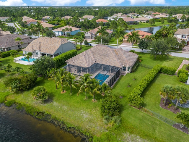 birds eye view of property featuring a water view