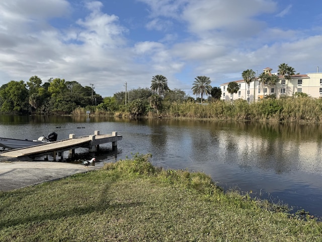 dock area featuring a water view