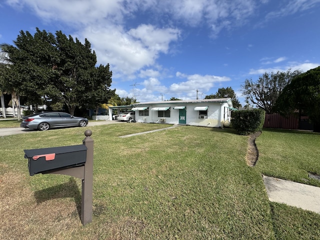 view of front of home featuring a front lawn