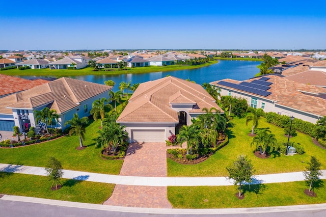 bird's eye view with a water view