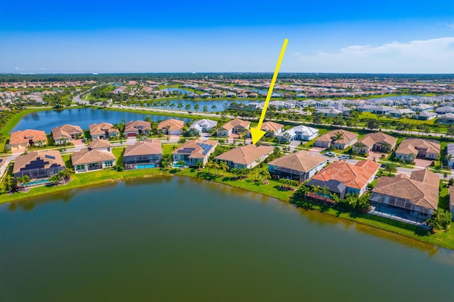 drone / aerial view featuring a water view