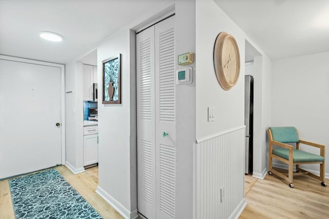 hall featuring light hardwood / wood-style flooring