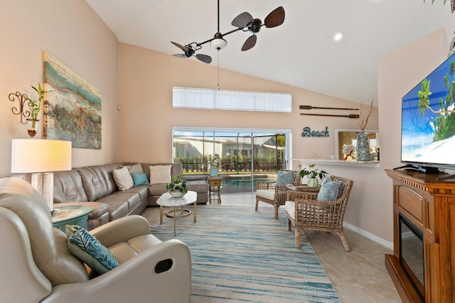 tiled living room with ceiling fan and high vaulted ceiling