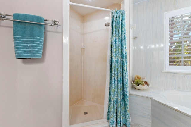 bathroom featuring curtained shower