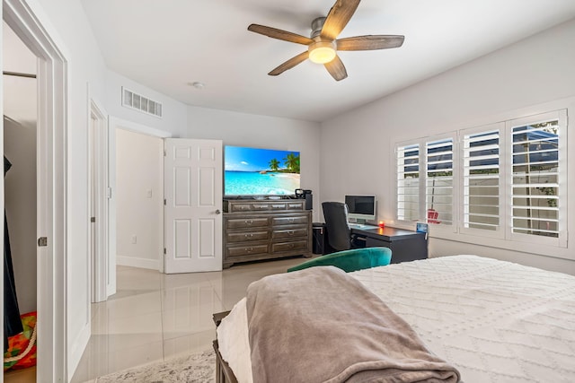 bedroom featuring ceiling fan and light tile patterned floors