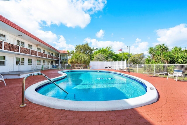 view of pool with a patio area