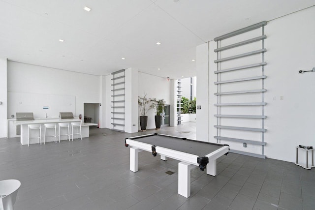 game room featuring dark tile patterned floors and billiards