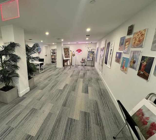 hallway featuring carpet floors