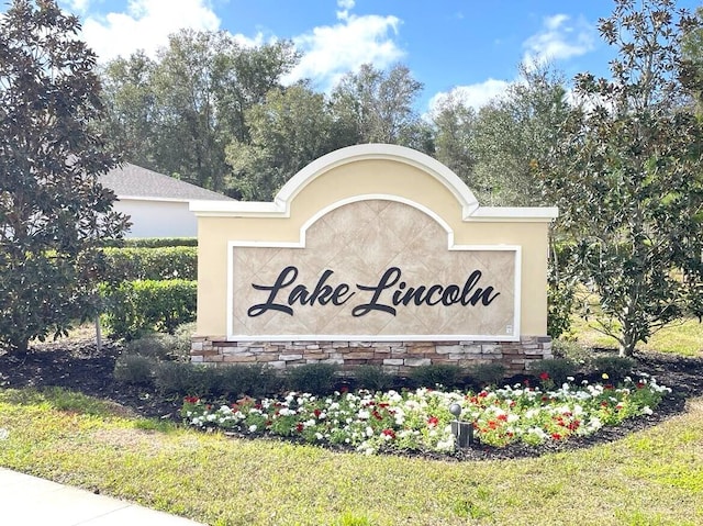 view of community sign