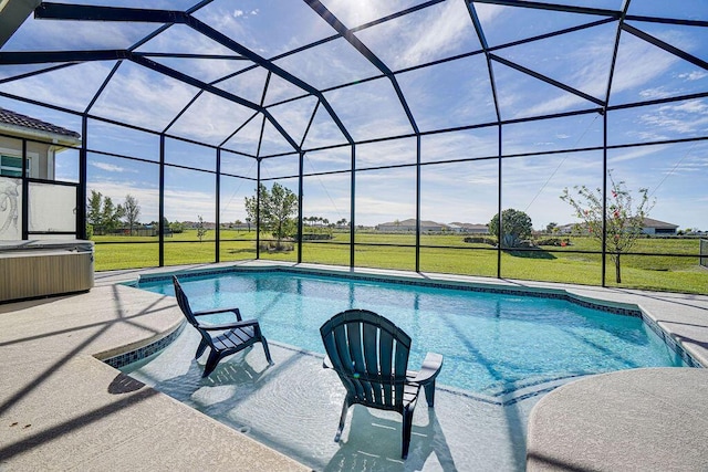 view of swimming pool featuring a patio, glass enclosure, and a lawn