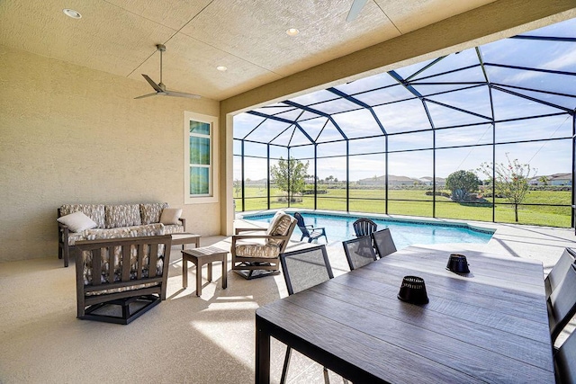 view of patio featuring a lanai and an outdoor hangout area