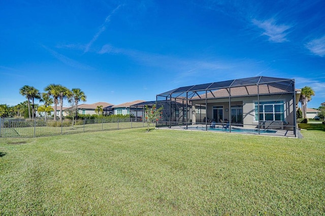 view of yard featuring a lanai and a fenced in pool