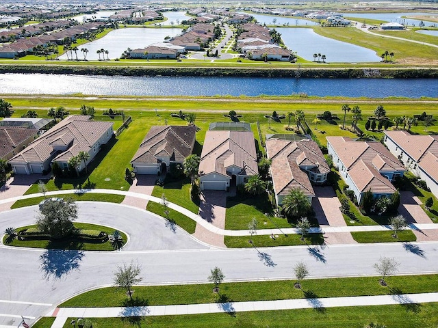 bird's eye view with a water view