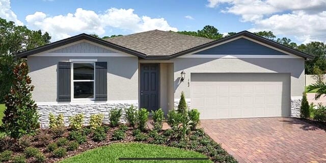 view of front of home with a garage