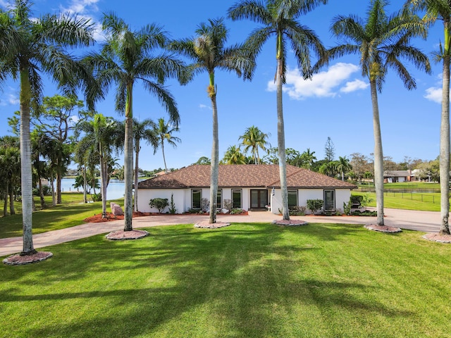 view of front of home with a front lawn