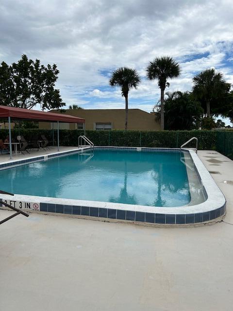 view of pool with a patio area