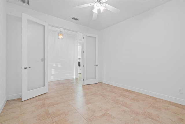9716 SW Chestwood Ave, Port Saint Lucie, FL 34987 - unfurnished room with visible vents, baseboards, and a ceiling fan