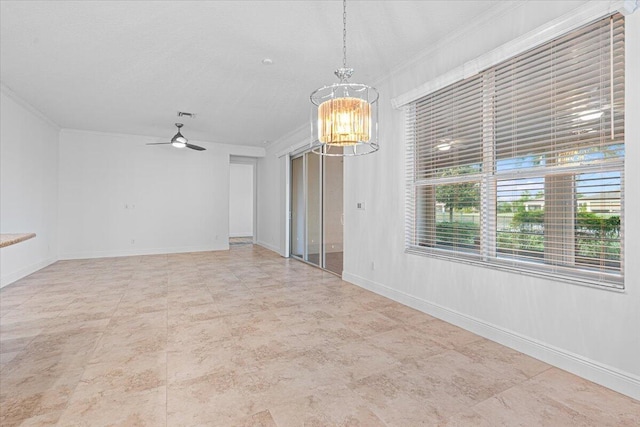 9716 SW Chestwood Ave, Port Saint Lucie, FL 34987 - spare room with ornamental molding, baseboards, visible vents, and ceiling fan with notable chandelier