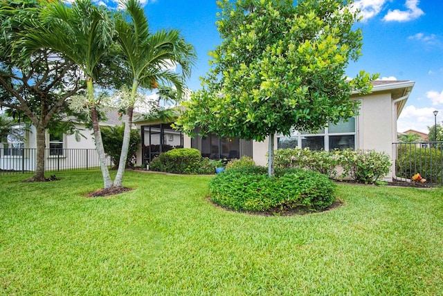9716 SW Chestwood Ave, Port Saint Lucie, FL 34987 - view of yard with fence and a sunroom