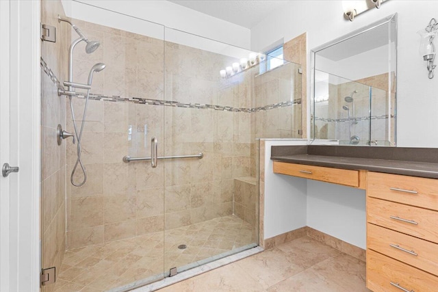 9716 SW Chestwood Ave, Port Saint Lucie, FL 34987 - bathroom with baseboards, a shower stall, and vanity
