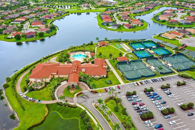 9716 SW Chestwood Ave, Port Saint Lucie, FL 34987 - aerial view with a water view and a residential view