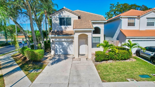 mediterranean / spanish-style house featuring a garage