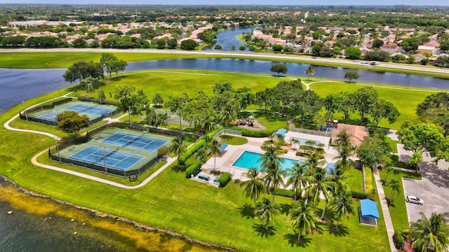 birds eye view of property with a water view