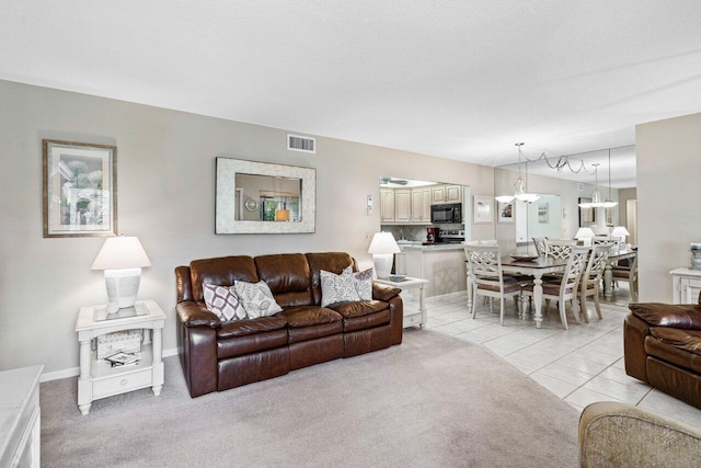 living room featuring light tile patterned floors