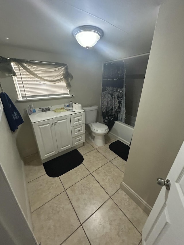 full bathroom with toilet, shower / tub combo, tile patterned flooring, and vanity