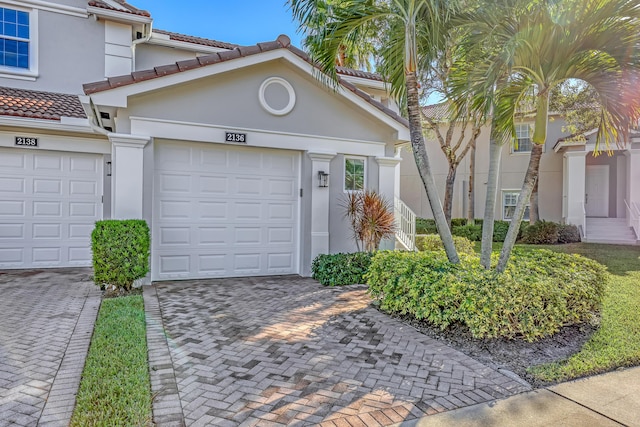 view of front of property with a garage