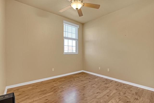 unfurnished room with ceiling fan and light hardwood / wood-style floors