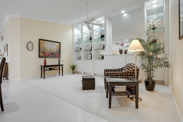 living area featuring light carpet, ceiling fan, and crown molding