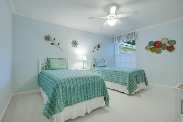 bedroom featuring carpet, ceiling fan, and crown molding