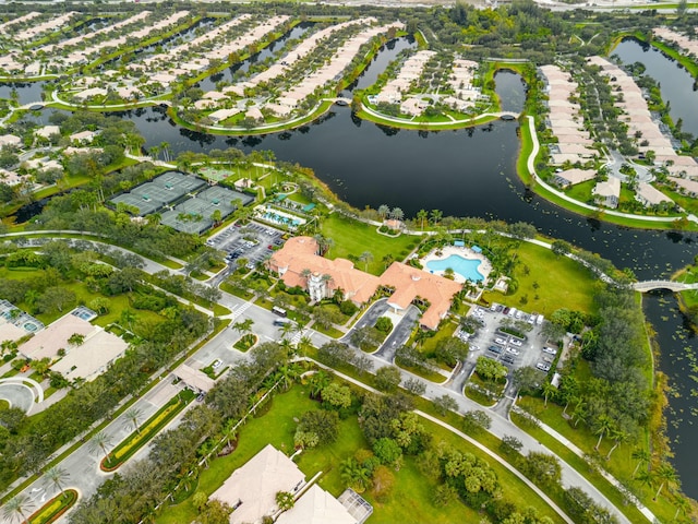 birds eye view of property featuring a water view