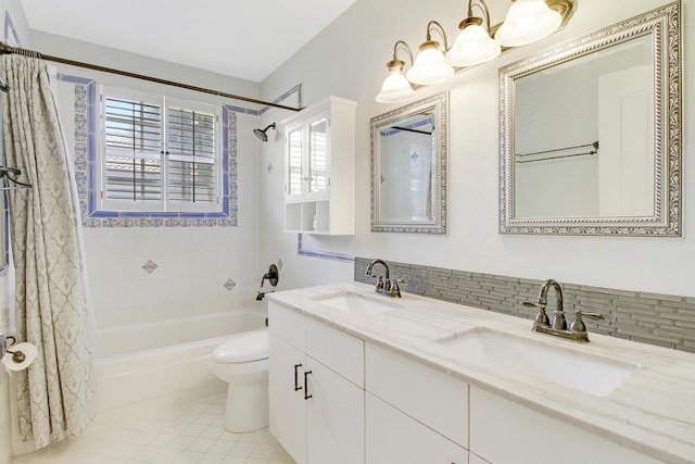 full bathroom with shower / bath combination with curtain, tasteful backsplash, vanity, tile patterned flooring, and toilet