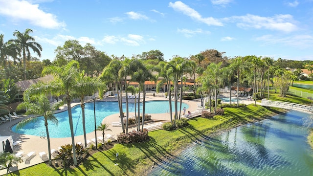 view of swimming pool with a patio