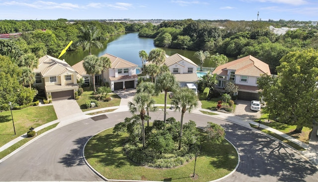 bird's eye view with a water view