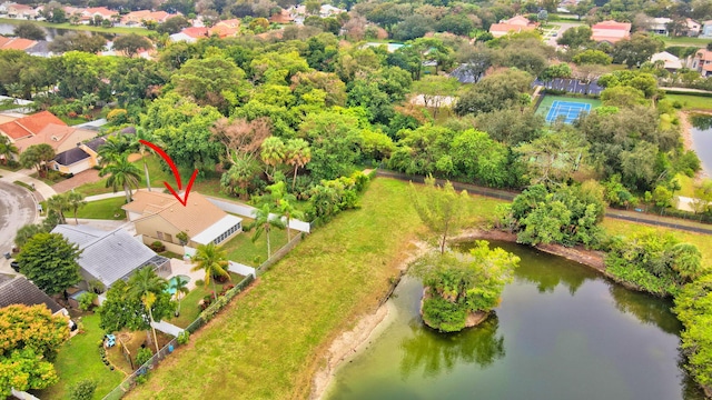 bird's eye view featuring a water view and a residential view