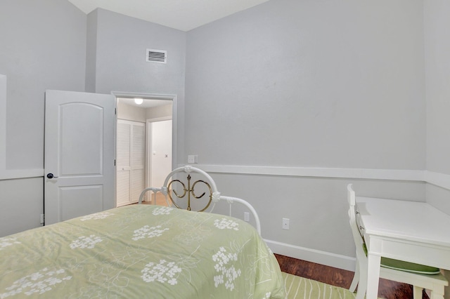 bedroom featuring wood-type flooring