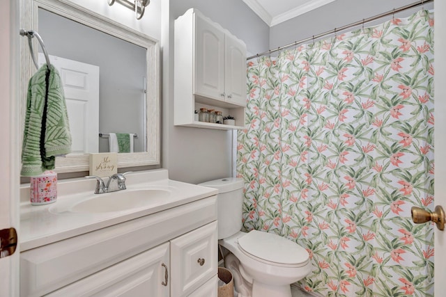 bathroom with ornamental molding, a shower with shower curtain, vanity, and toilet