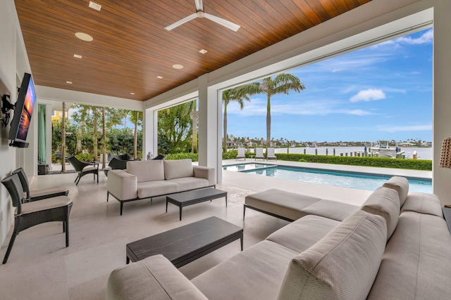 view of patio / terrace featuring ceiling fan and an outdoor living space