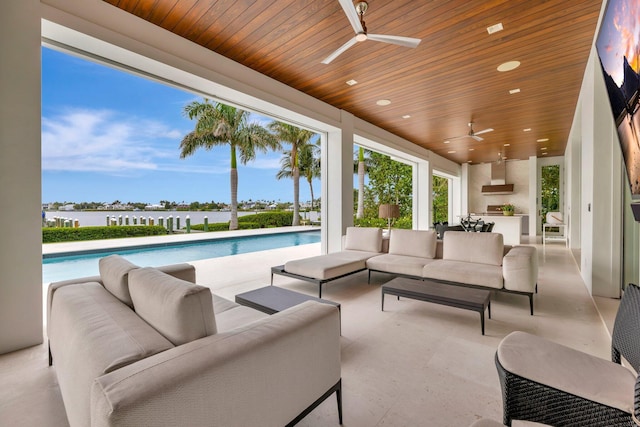 view of patio / terrace featuring ceiling fan and an outdoor hangout area