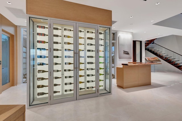 wine area with light tile patterned floors