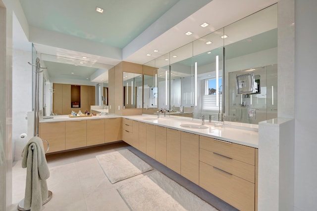 bathroom featuring vanity and tile patterned floors