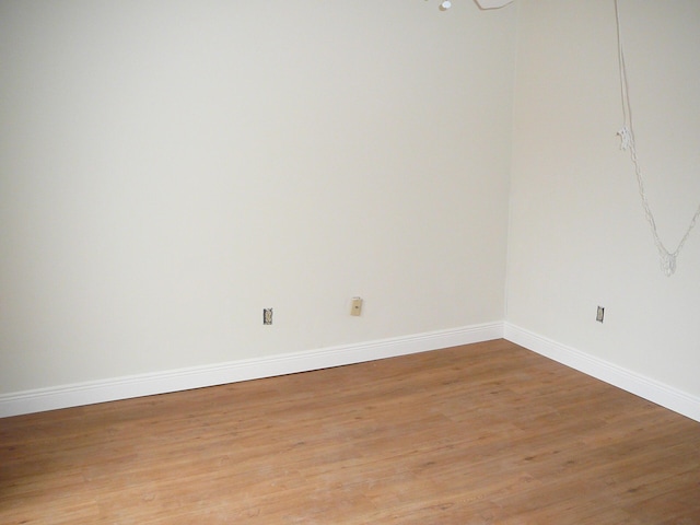 empty room featuring light hardwood / wood-style floors