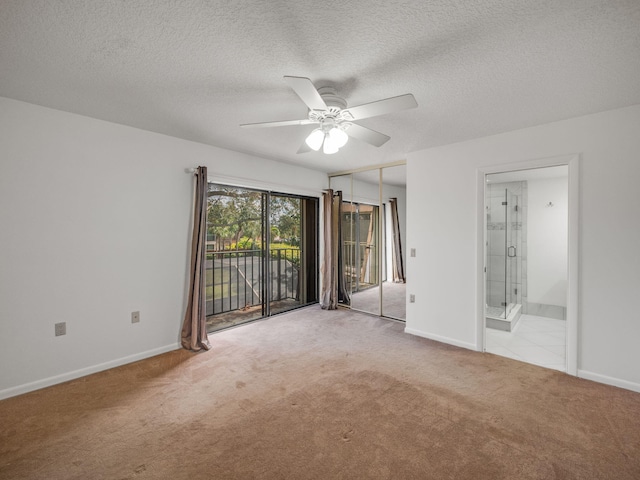 unfurnished bedroom with access to outside, ensuite bathroom, ceiling fan, light colored carpet, and a closet