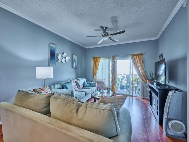 living room featuring ceiling fan, dark hardwood / wood-style floors, crown molding, and a textured ceiling